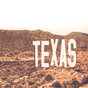 Texas landscape with large Texas sign representing real estate market trends in 2026