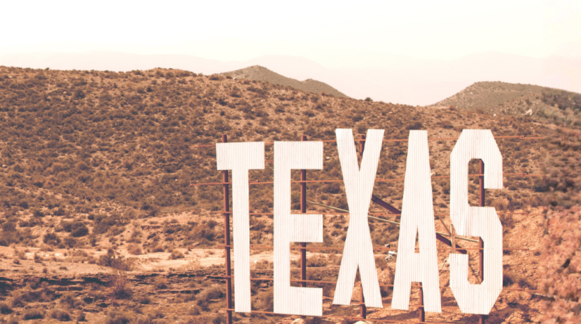 Texas landscape with large Texas sign representing real estate market trends in 2026